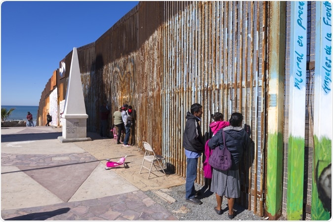 Border wall in Playas de Tijuana. Image Credit: Chad Zuber / Shutterstock