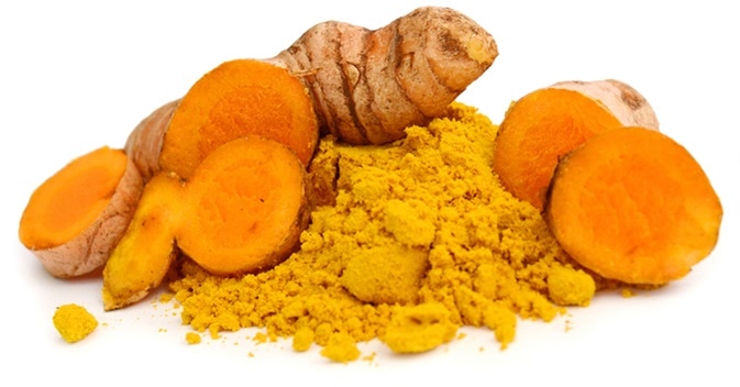 Turmeric powder and turmeric. Image Credit: COLOA Studio / Shutterstock Turmeric powder and turmeric. Image Credit: COLOA Studio / Shutterstock