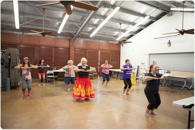 Hula dance class with instructor, Hula teacher (kuma hula) Ka’olu Luning, Ke Ola Mamo Health Systems Medical Clinic, Honolulu, HI. Copyright Nicasello Photography