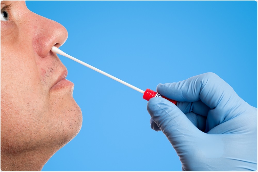 Man using nasal swab