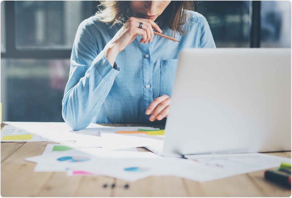 Woman working overtime at desk