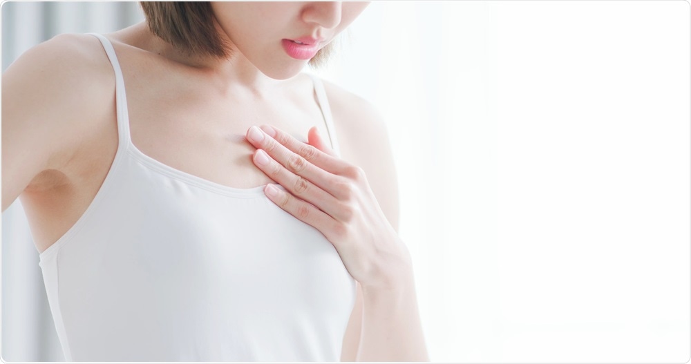 Woman with unpleasant chest ache