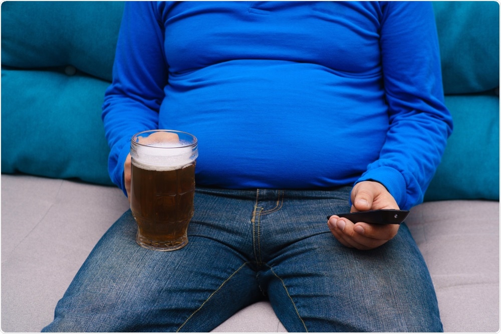 Man sat on couch - sedentary lifestyle