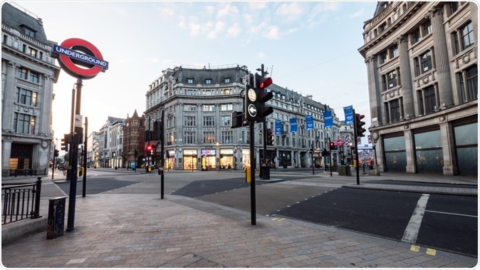 LONDON, UK - 22 MAY 2018: Empty London. Oxford Circus with no traffic or pedestrians. The busy shopping district is normally gridlocked with human traffic. Image Credit:  pxl.store / Shutterstock