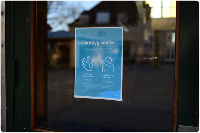 Charlottenlund, Gentofte, Denmark March 22. 2020: Notice regarding COVID-19 on school door, Charlottenlund, Denmark. Image Credit Rolf Knudsen / Shutterstock