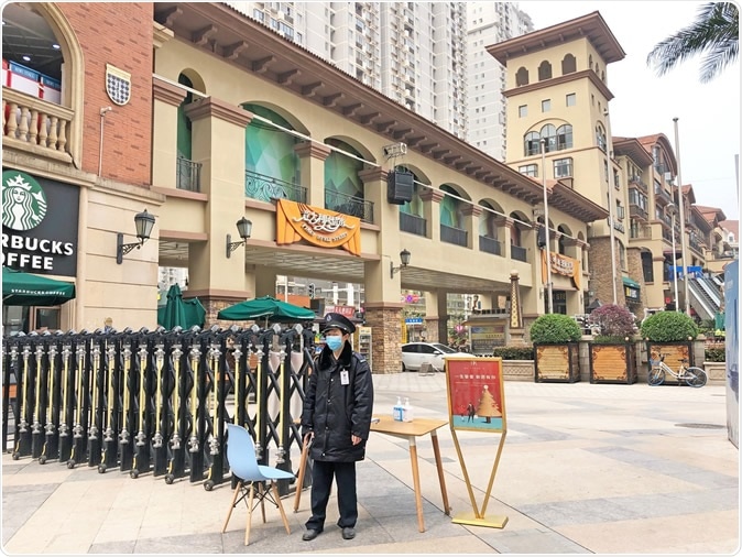 Wuhan, Hubei / China - April,3,2020 : Wuhan Guanggu shopping city still have guards screening process after Chinese government canceled the lockdown in Wuhan. Image Credit: Mark Brandon / Shutterstock