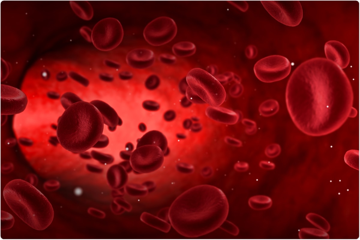 ID: red blood cells float along in a vein with small white particles scattered around.