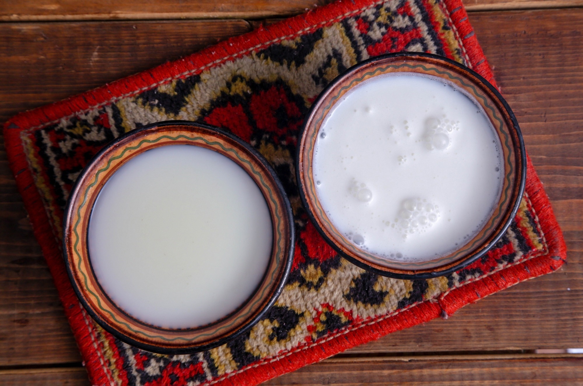 Cups of camel milk from above.