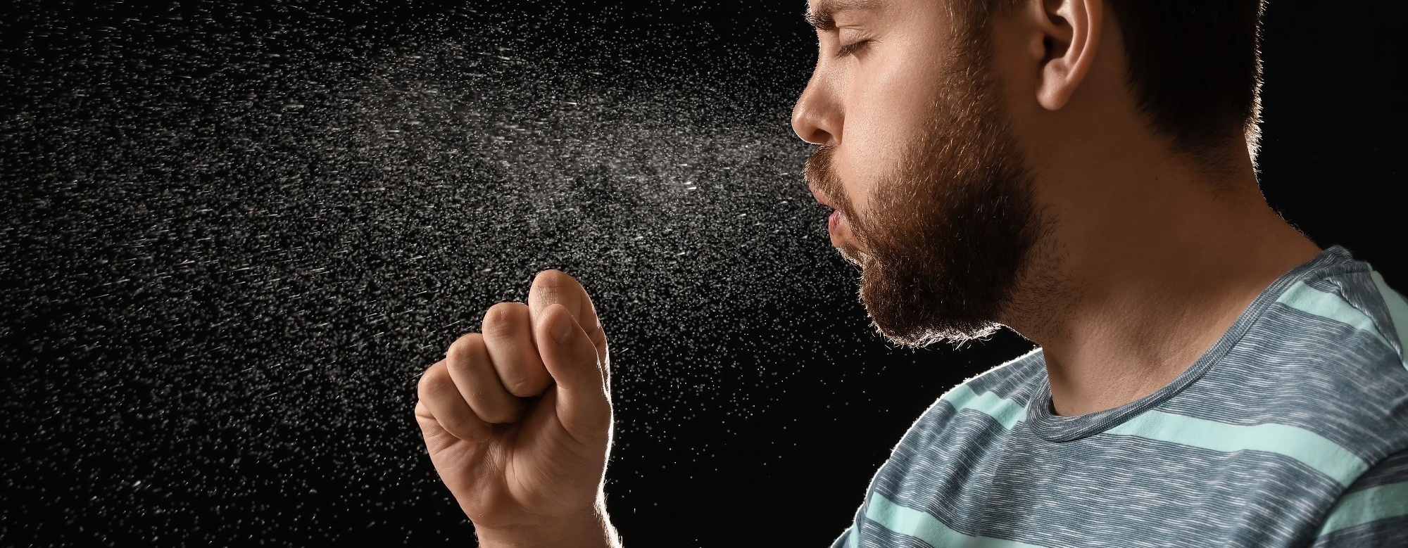 Why did influenza fail to spread in a crowded indoor setting?