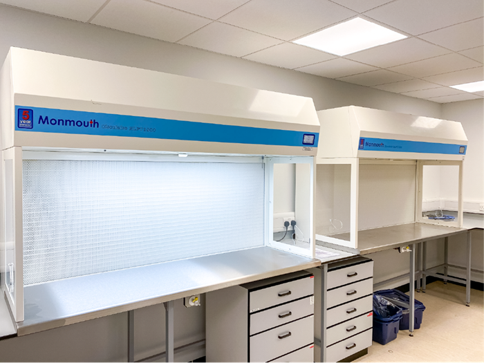 Image of two Monmouth lab clean benches in a working lab.