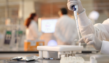 Scientist preparing samples for sequencing