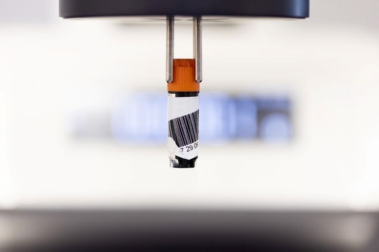 Barcode on a sample tube. Note how it has folded over on itself, potentially causing issues