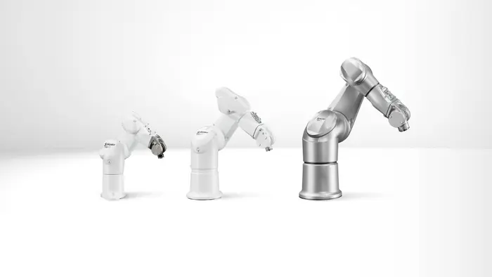 Three different robotic manufacturing arms.