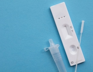 Review on lateral flow test use spearheaded by SARS-CoV-2 pandemic