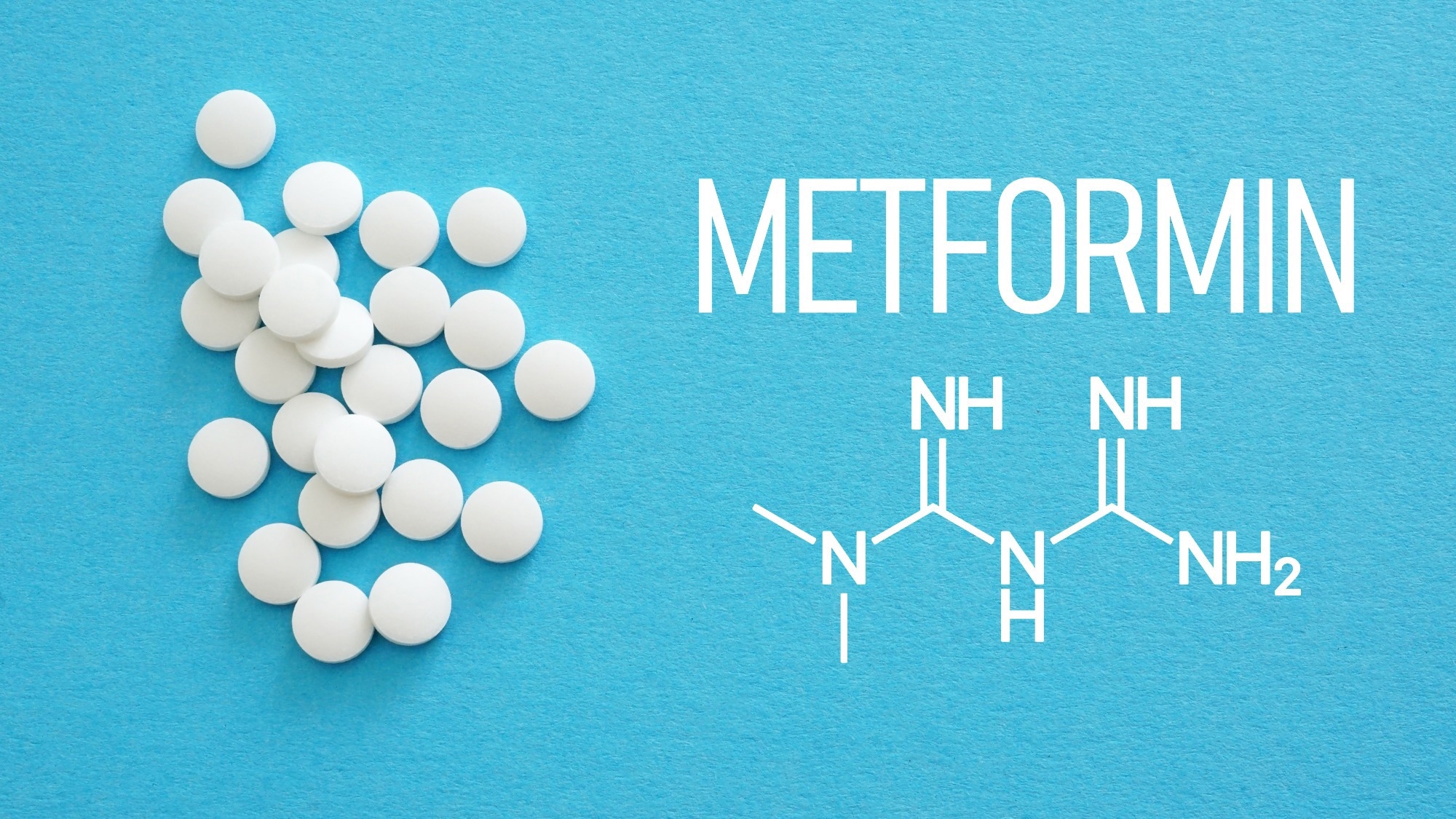 Blue background. White circular tablet. White texts says metformin which chemical structure drawn belowtext.