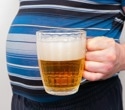 Heavy alcohol intake is associated with dangerous belly fat accumulation, large UK study shows