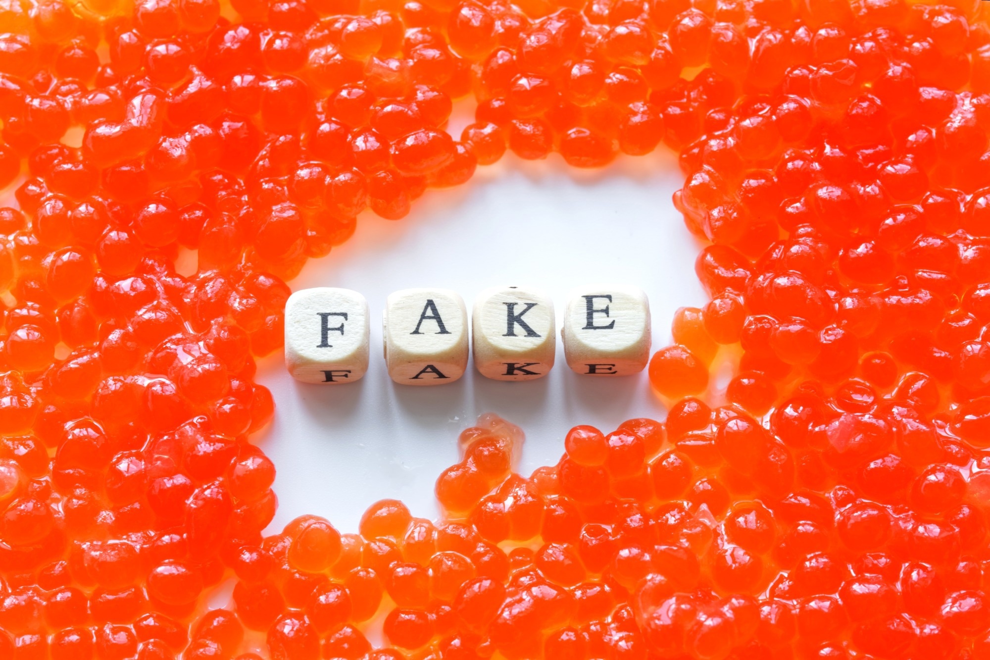 Fake red caviar. Study: The cost of food fraud in the UK: Measurement and implications. Image Credit: s880 / Shutterstock