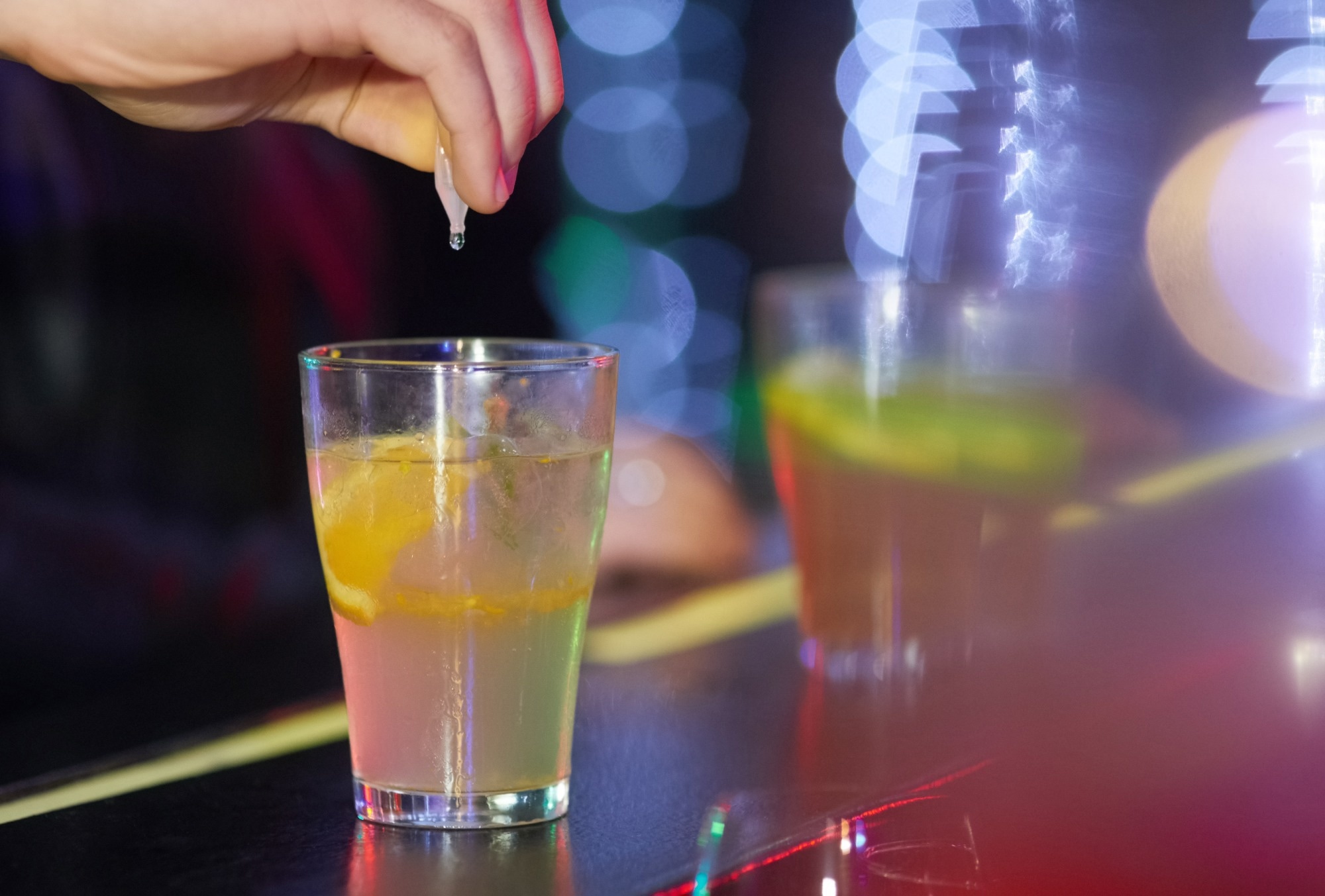 Understanding drink spiking and needling experiences and reporting in the UK. Image Credit: PeopleImages / Shutterstock