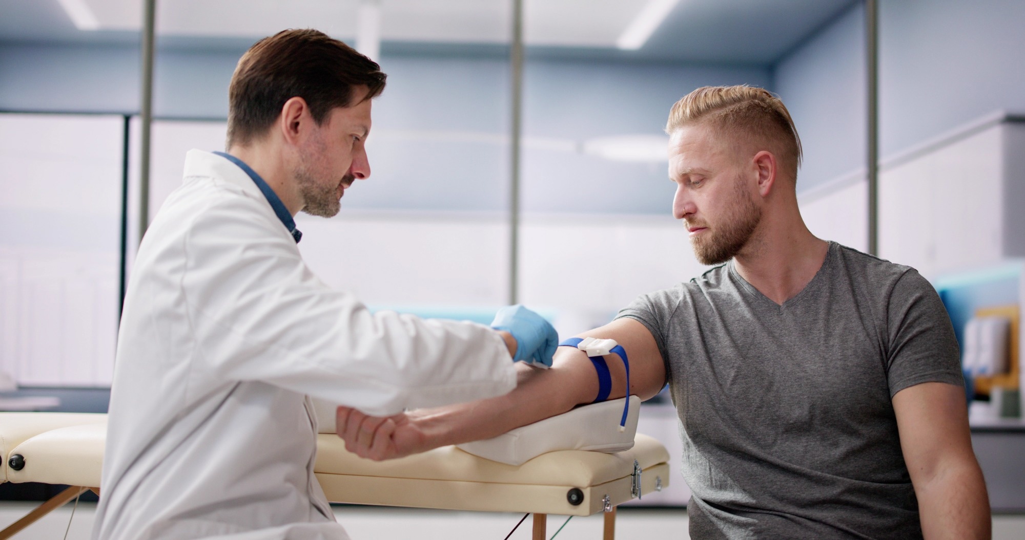 Patient Blood Draw By Doctor